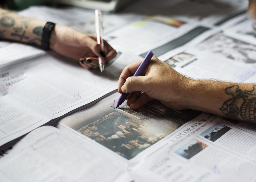 A hand signing a document in ink, unhurried.